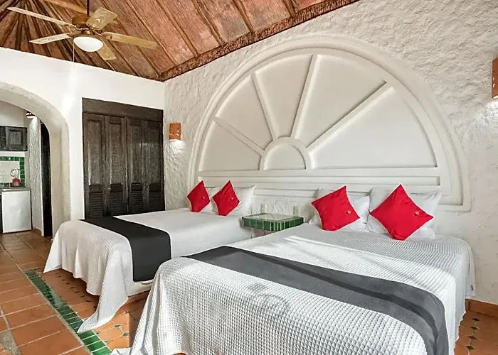 Capital O Mimi Del Mar, Hotel